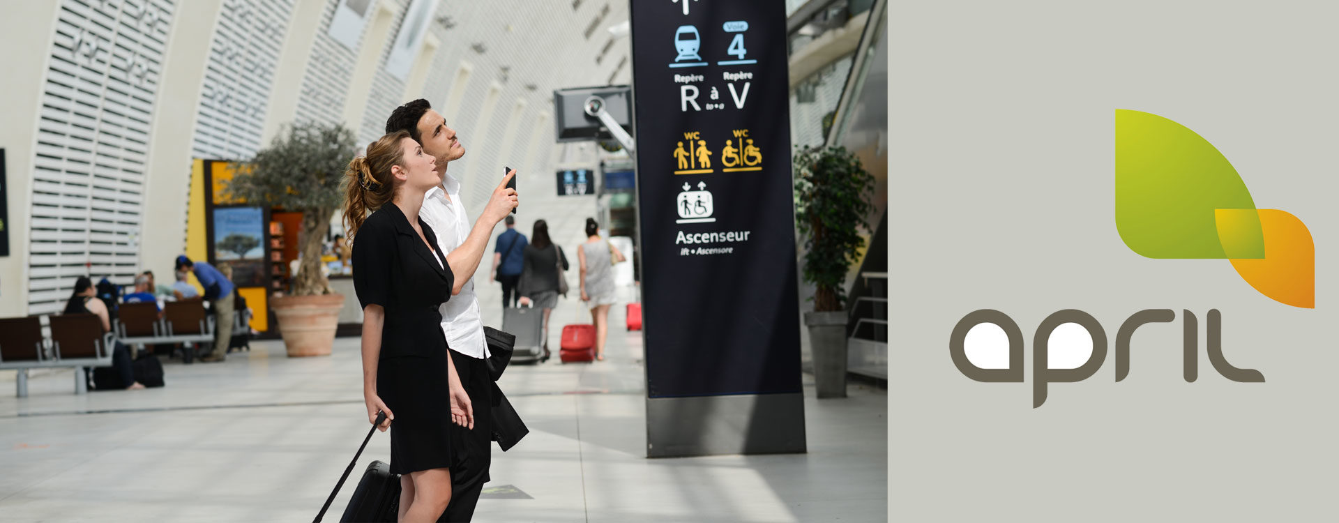 couple en voyage d'affaires et logo april